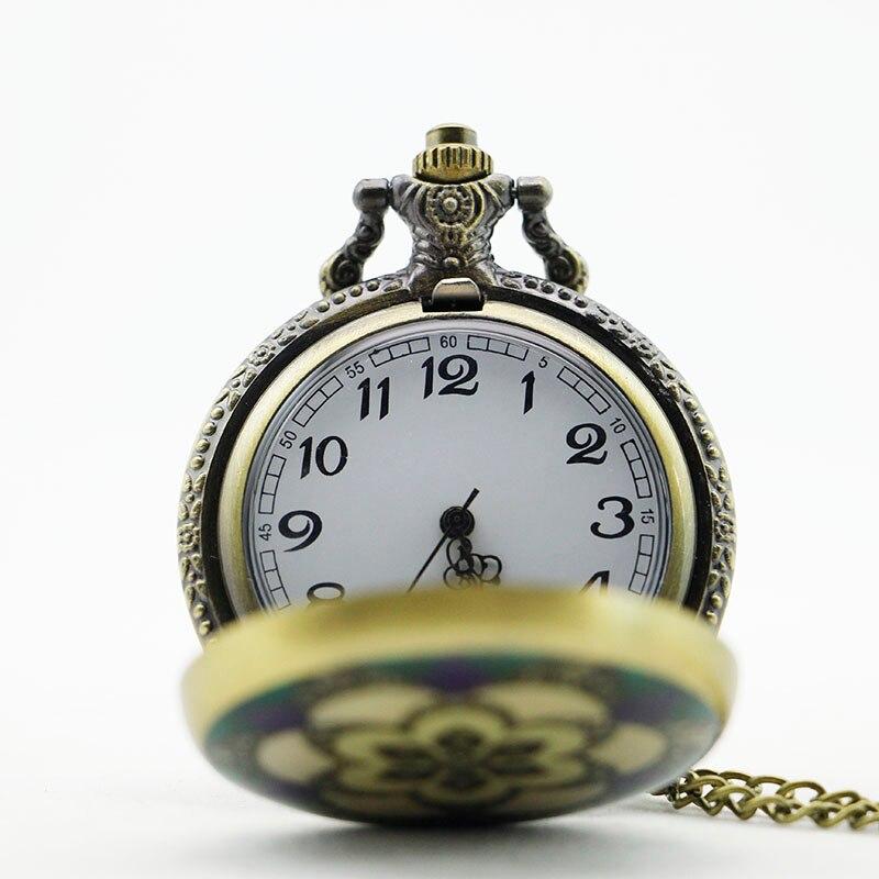 Montre Ă gousset fleur bleue sur le capot avant Ma montre Ă gousset