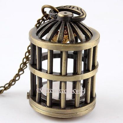Montre pendentif mouvement quartz en forme de cage contenant un petit oiseau doré Ma montre à gousset